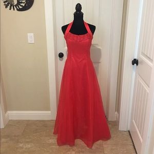 Coral colored floor length formal gown